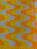 Wavy Line Velvet Sequins - Aqua Iridescent/Orange/Clear - Velvet Sequins 2 Way Stretch Fabric 58/60” By Yard