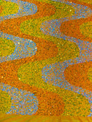 Wavy Line Velvet Sequins - Aqua Iridescent/Orange/Clear - Velvet Sequins 2 Way Stretch Fabric 58/60” By Yard