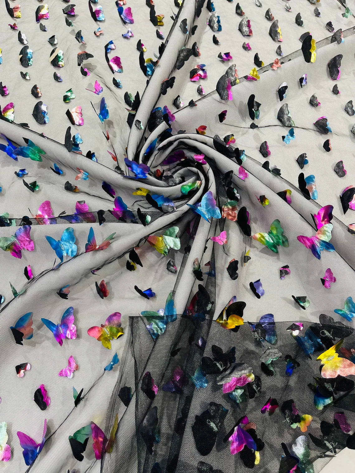 3D Holographic Rainbow Fabric - 3D Rainbow Foil Butterfly on Solid Black Mesh Sold By Yard