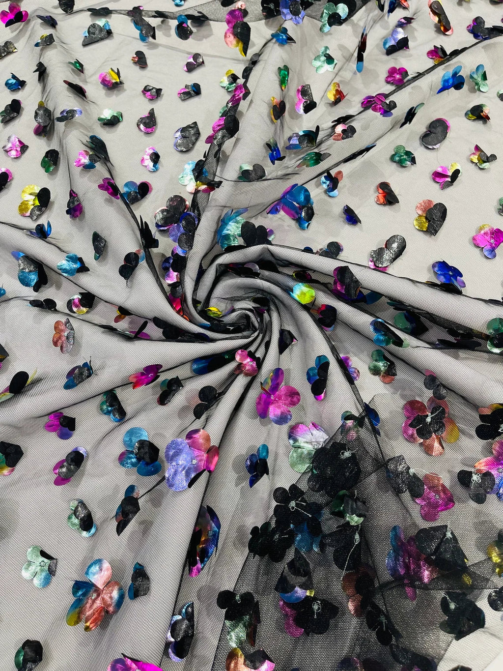 3D Holographic Rainbow Fabric - 3D Rainbow Foil Flowers on Solid Black Mesh Sold By Yard