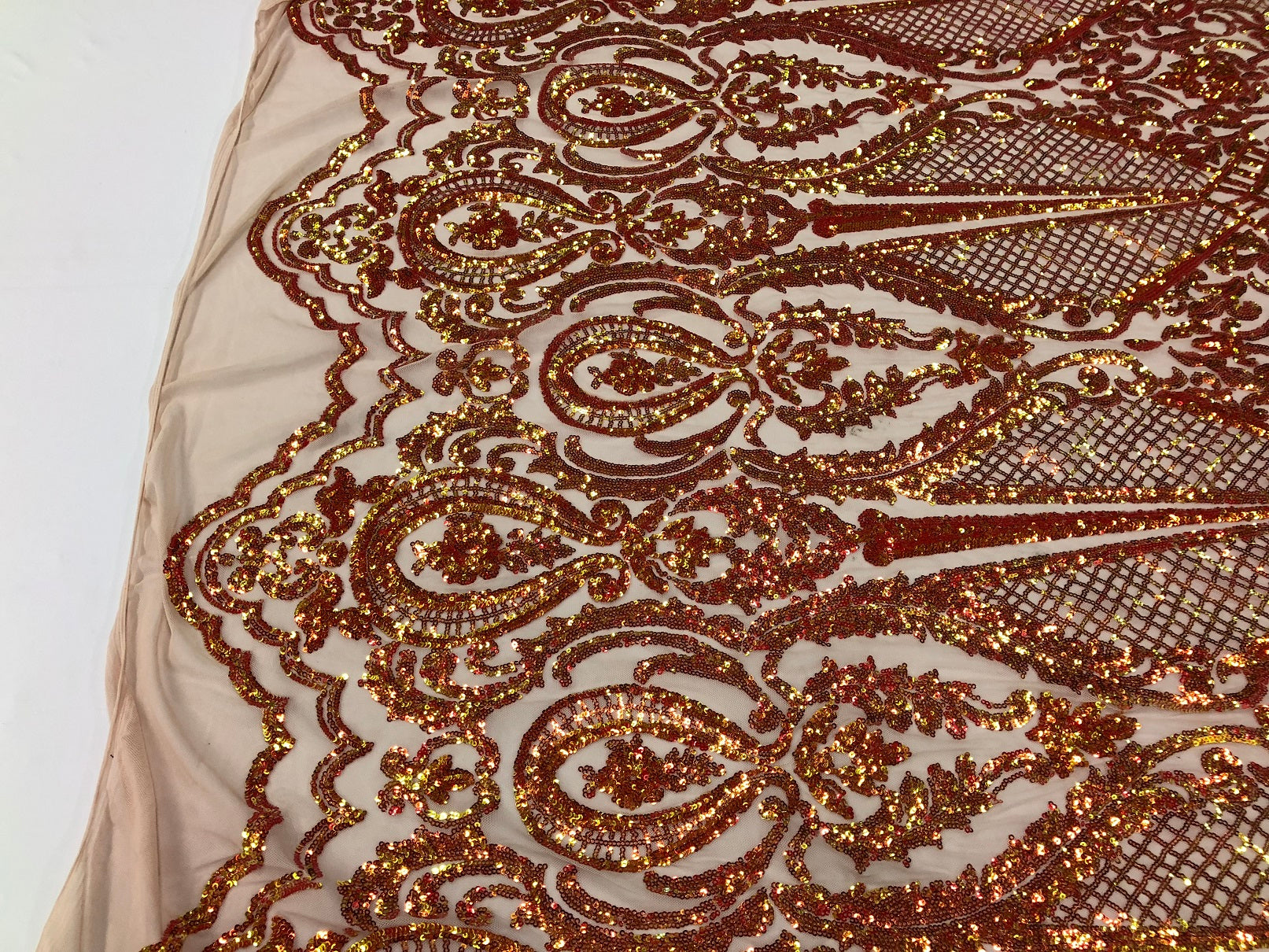 Iridescent Orange Sequin, 4 Way Stretch Damask Design Fabric On Blush Stretch Mesh By The Yard