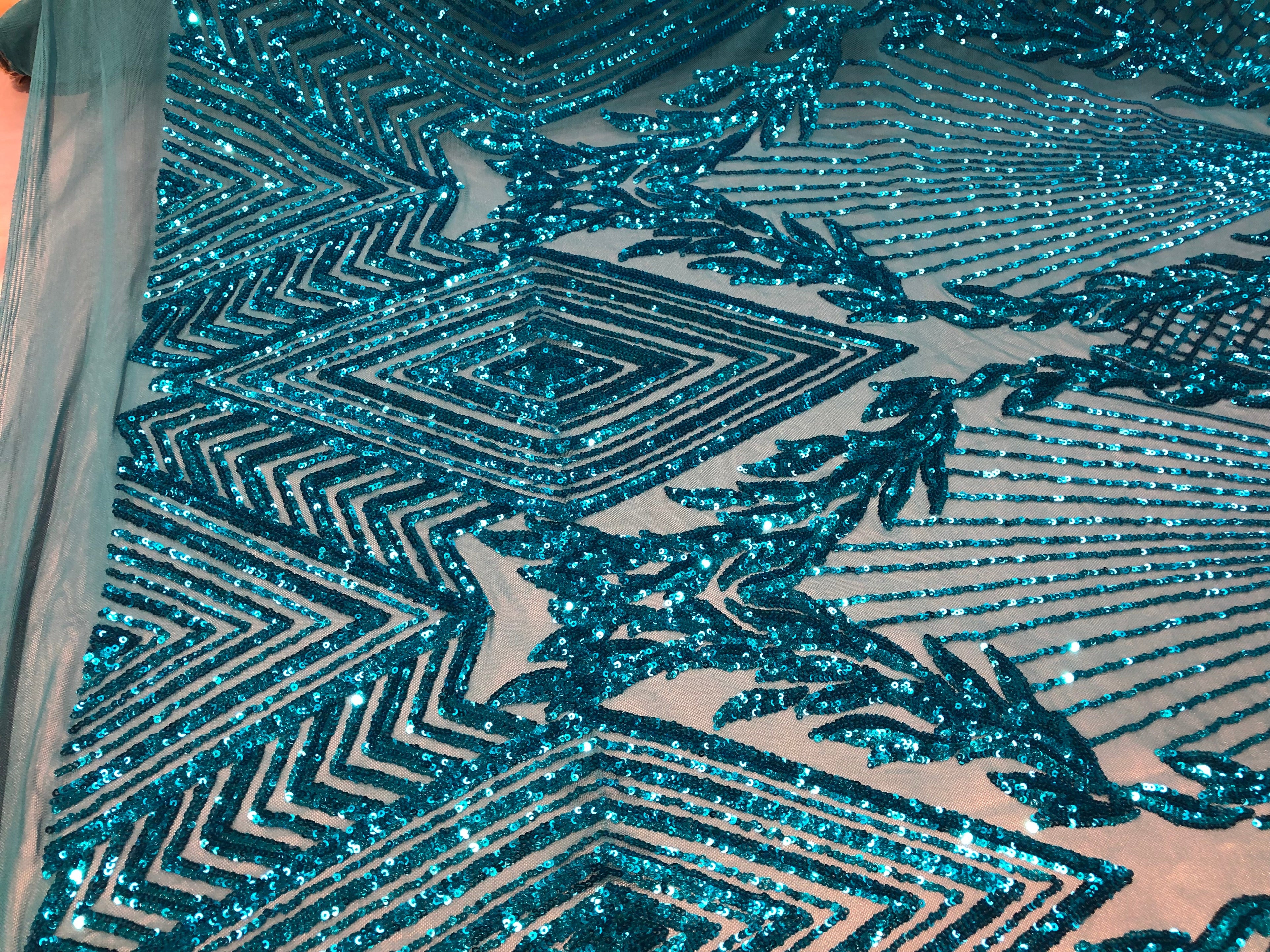 4 Way Stretch - Turquoise  - Geometric Design Sequins On Mesh Beautiful Fashion Fabrics Sold By Yard