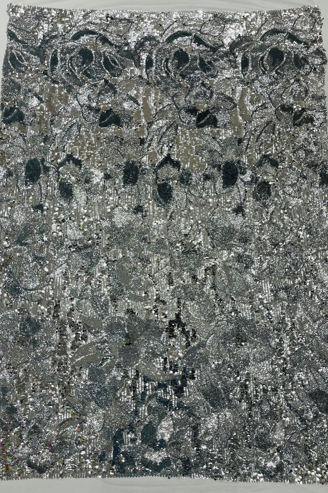 Orchid Design Sequins - Silver on White - 4 Way Stretch Full Sequins Floral Design Mesh Fabric By Yard
