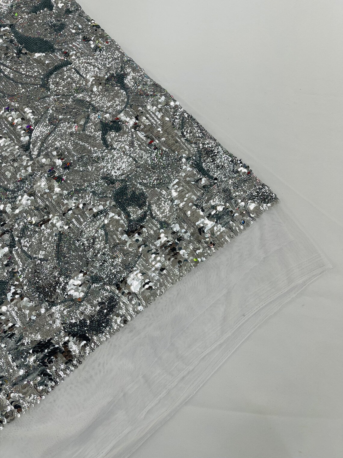 Orchid Design Sequins - Silver on White - 4 Way Stretch Full Sequins Floral Design Mesh Fabric By Yard