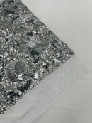 Orchid Design Sequins - Silver on White - 4 Way Stretch Full Sequins Floral Design Mesh Fabric By Yard