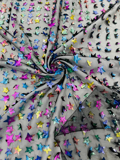 3D Holographic Rainbow Fabric - 3D Rainbow Foil Stars on Solid Black Mesh Sold By Yard
