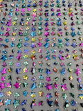3D Holographic Rainbow Fabric - 3D Rainbow Foil Stars on Solid Black Mesh Sold By Yard