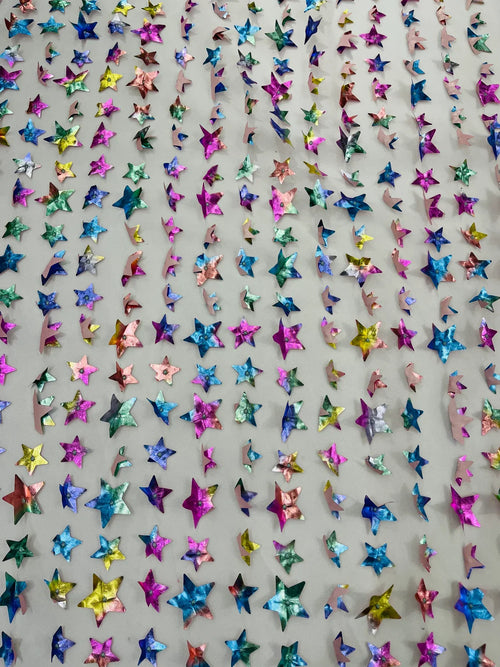 3D Holographic Rainbow Fabric - 3D Rainbow Foil Stars on Solid White Mesh Sold By Yard