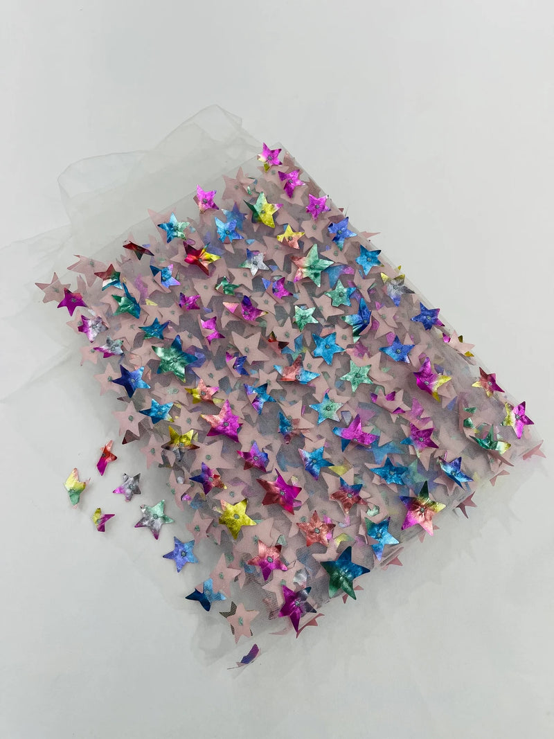 3D Holographic Rainbow Fabric - 3D Rainbow Foil Stars on Solid White Mesh Sold By Yard
