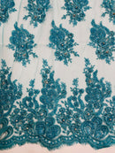 Rhinestone Beaded Fabric - Turquoise - Beaded Floral Rhinestone Design with Fancy Border Sold By Yard