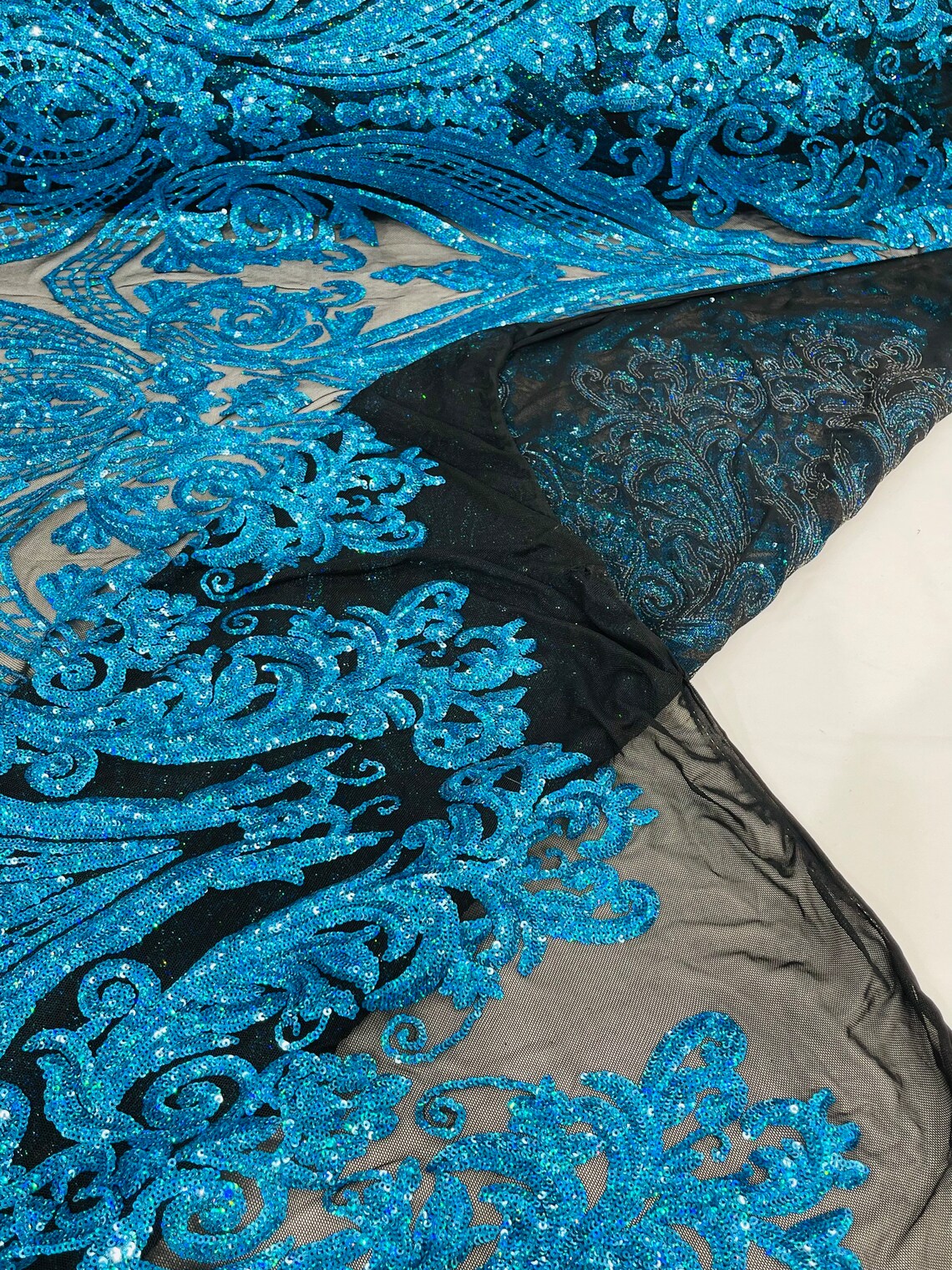 Big Damask Sequins Fabric - Turquoise Iridescent on Black - 4 Way Stretch Damask Sequins Design Fabric By Yard