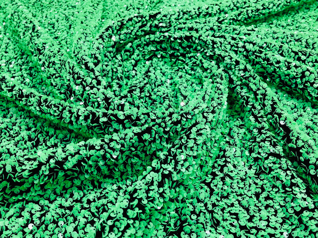 Green Sequin Fabric on Black Stretch Velvet - by the yard - Sequins 2 Way Stretch  58/60”