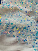 Velvet Stretch Sequins - Irisdescent Clear Sequins on White 2 Way Stretch Velvet Fabric 58/60”