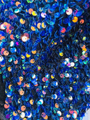 Velvet Stretch Sequins - Irisdescent Rainbow Sequins on Black 2 Way Stretch Velvet Fabric 58/60”