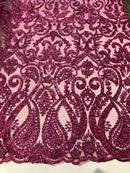 Magenta Beaded Fabric Embroidered On A Mesh Fancy Dresses Fabric Sold By The Yard