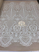 Sequins - White on Nude Mesh - 4 Way Stretch Fancy Fabric Embroidered On Mesh Sold By The Yard