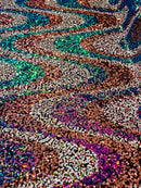 Multi-Color Wavy Sequins - Multi-Color Green/Orange/Pink/White - Sequins Design on Black Mesh Fabric Sold By Yard