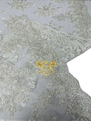 Floral Beaded Fabric - White - Embroidered Beaded Flowers Cluster Design on a Mesh Sold By Yard