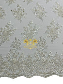 Floral Beaded Fabric - White - Embroidered Beaded Flowers Cluster Design on a Mesh Sold By Yard