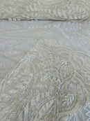 Beaded Pattern Fabric - Ivory - Embroidered Fancy Beads Pattern On Mesh Fabric Sold By Yard
