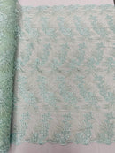 Floral Plant Cluster Fabric - Mint - Embroidered High Quality Lace Fabric Sold by Yard